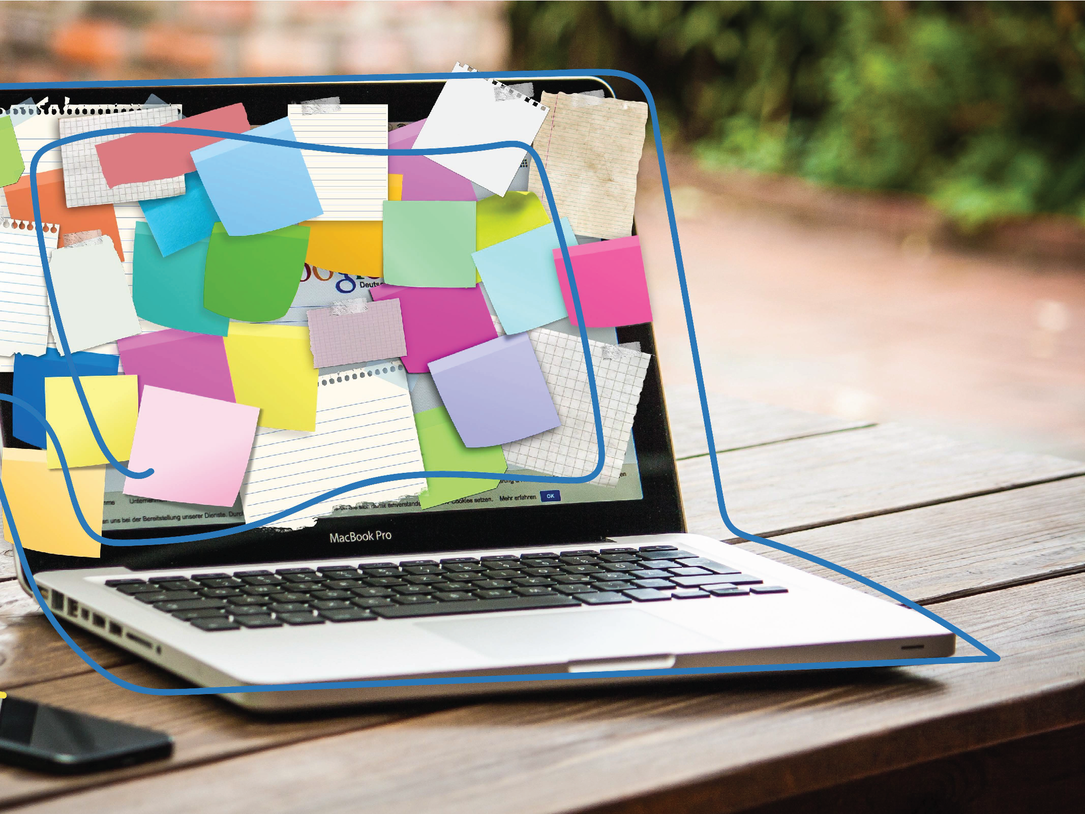 laptop covered in post-it notes